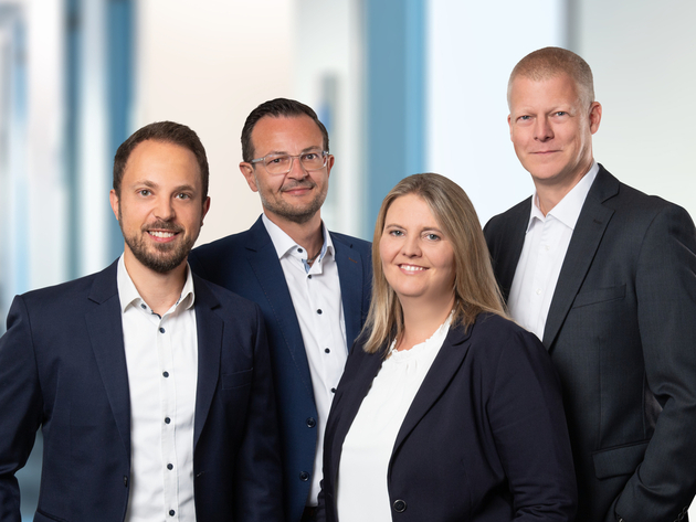 Gruppenbild der vier Gesamtprokurist:innen